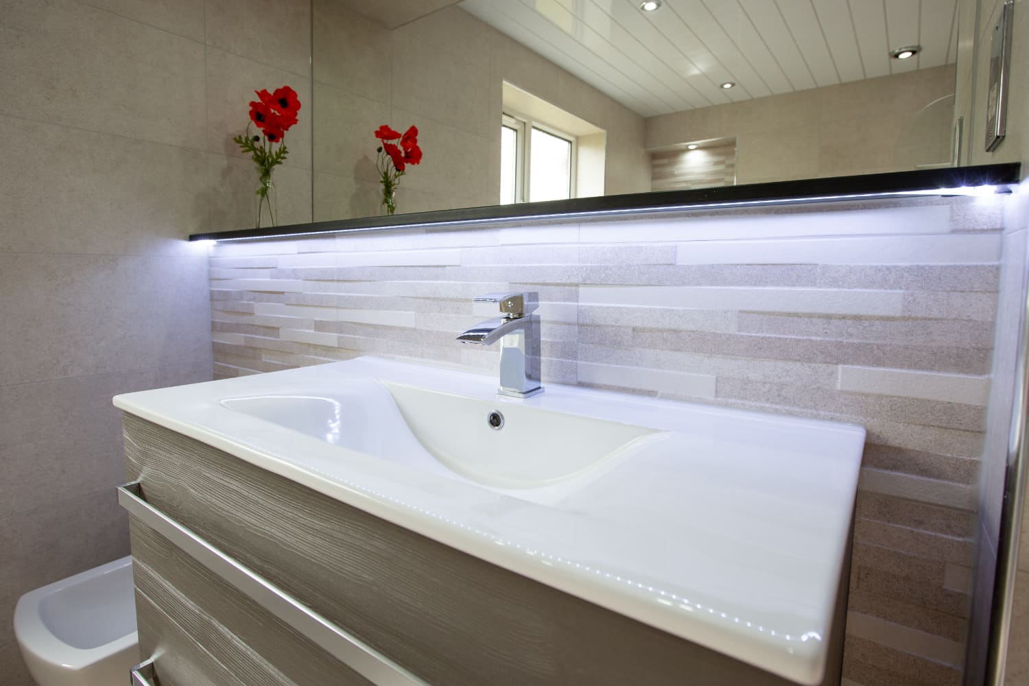 Three luxurious, calming modern bathrooms for Burnley home